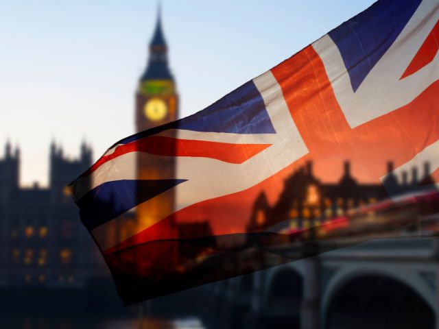 British Union Jack and London's Big Ben at dusk