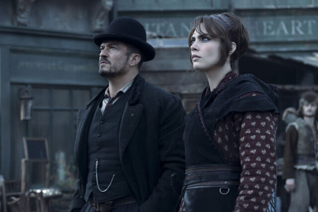 Orlando Bloom (Rycroft Philostrate), Cara Delevingne (Vignette Stonemoss) in Carnival Row season 2