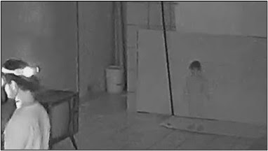 Child apparition screenshot from Paranormal Caught on Camera trailer