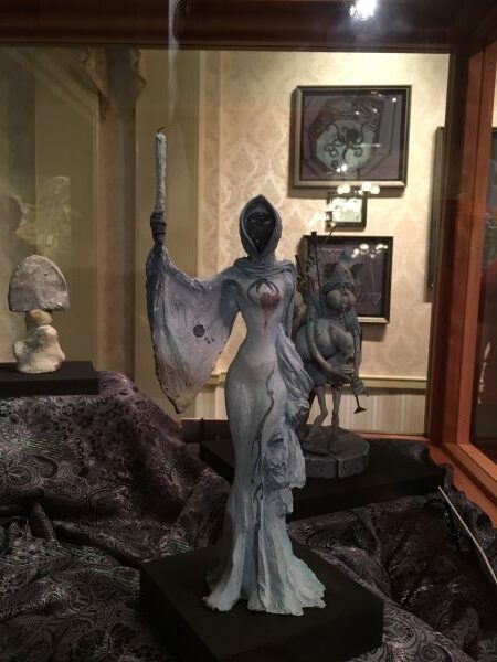 Creepy Haunted Mansion female specter sculpture
