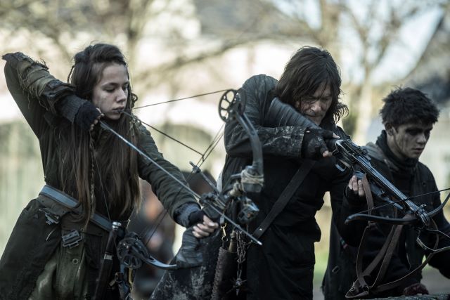 Norman Reedus pointing bow as Daryl Dixon in The Walking Dead: Daryl Dixon