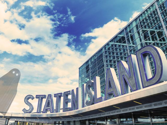 Staten Island's most haunted places - ferry sign with ghost