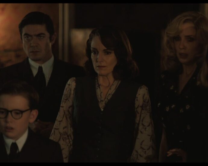 Jude Hill, Riccardo Scamarcio, Tina Fey, Kelly Reilly, and Camille Cottin in A Haunting in Venice