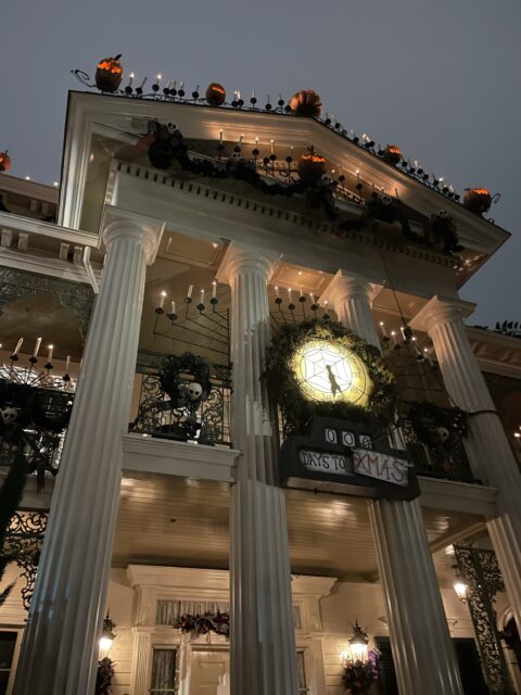 Days to Christmas clock on front of Haunted Mansion