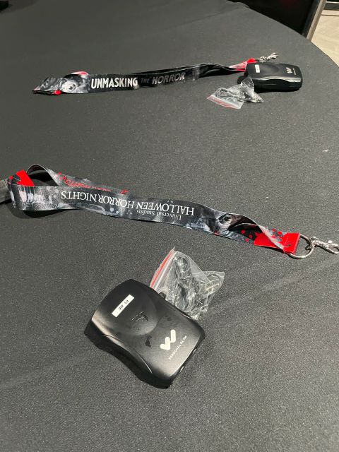 Halloween Horror Nights lanyard and transceivers at Behind the Screams tour